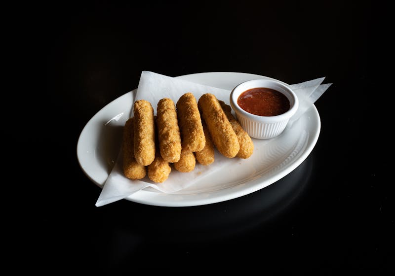 Golden toasted ravioli served with marinara dipping sauce