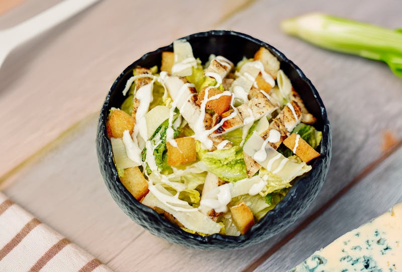 Chicken Caesar salad with croutons and Parmesan
